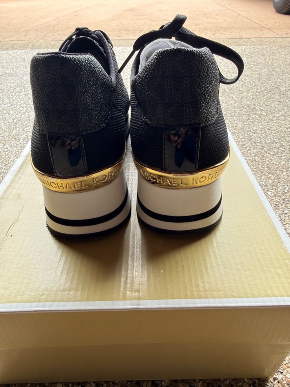 Michael Kors Black Knit Platform Trainer Sneakers with Gold Accents - Picture 4 of 6